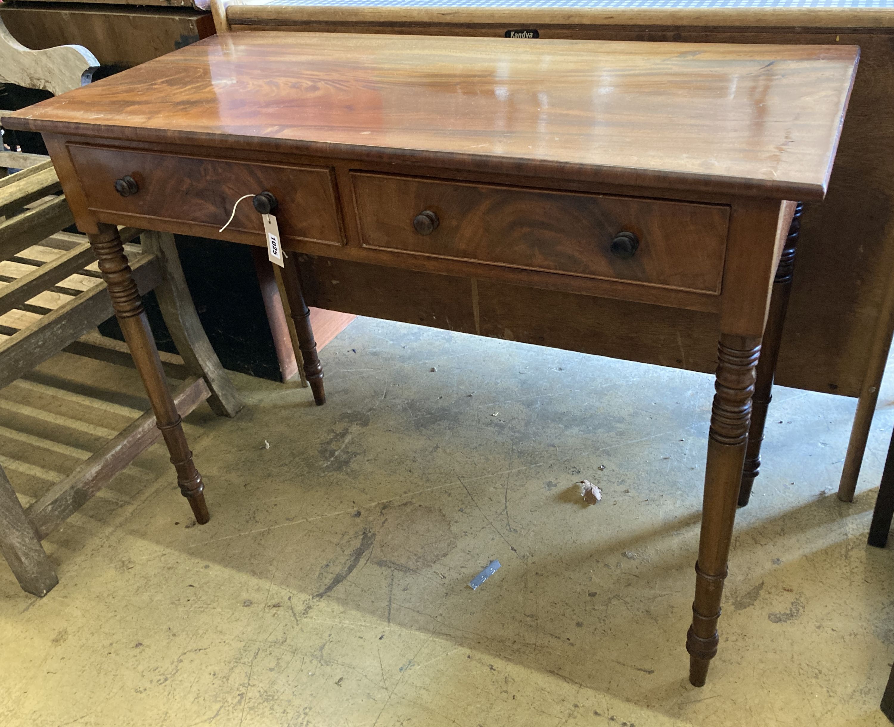 A mahogany Victorian two drawer side table, width 106cm, depth 49cm, height 82cm